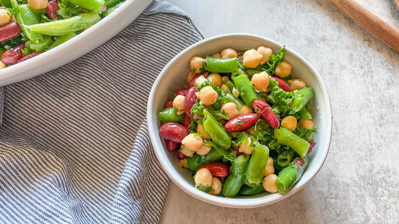 Small bowl of chickpea, kidney bean, and green bean salad 