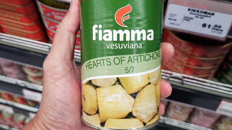 Handheld can of artichoke hearts