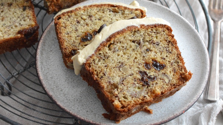 slices of banana bread with cream cheese frosting