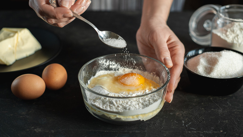 Person making cake batter