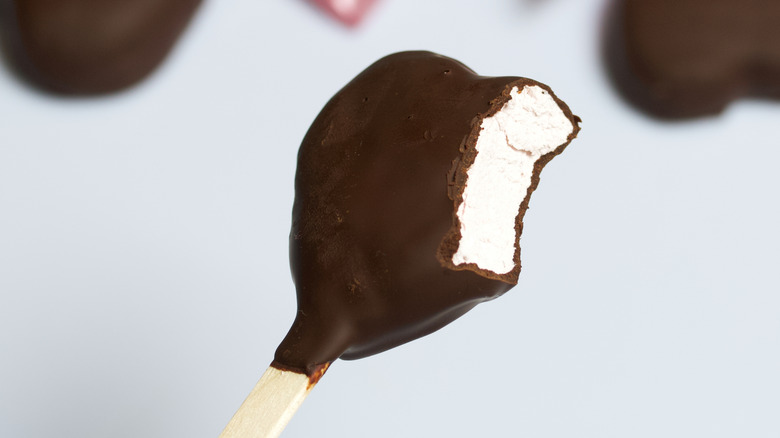 Chocolate-covered marshmallow heart on stick