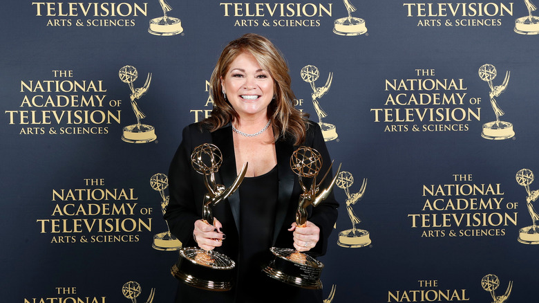 valerie bertinelli holding two emmy awards