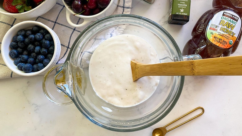 yogurt and wooden spoon