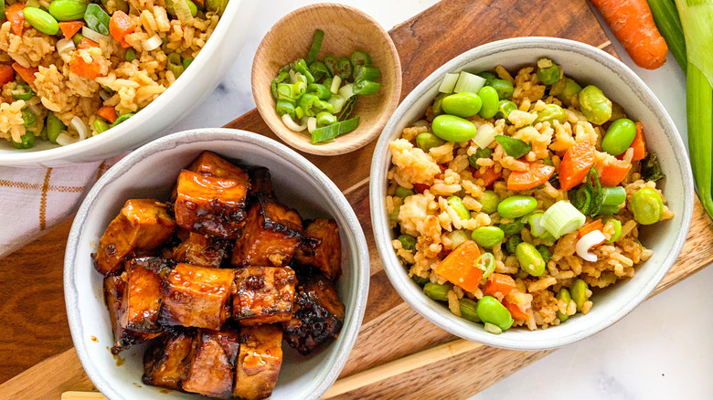 rice and tofu on cutting board 