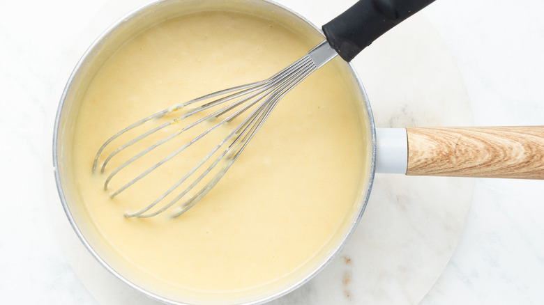 white sauce in saucepan