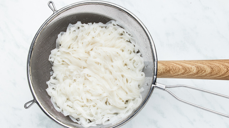 noodles in a strainer 