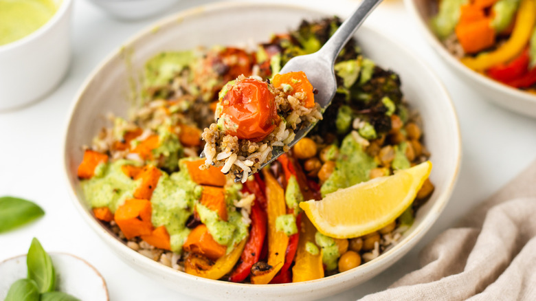 forkful of vegan pesto grain bowl