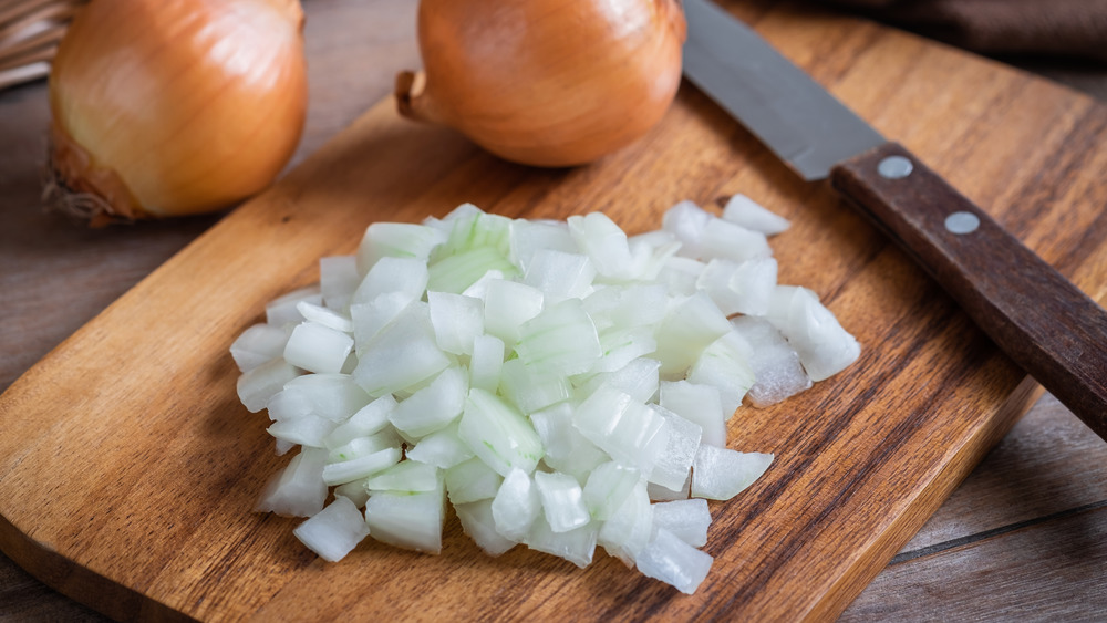 diced onions on cutting board