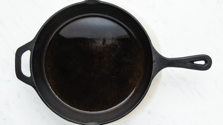 Oil heating in cast iron skillet