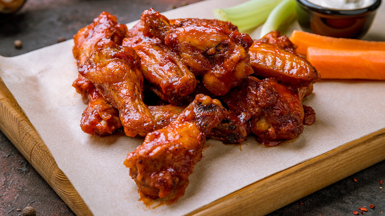 Chicken wings on cutting board