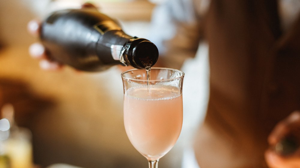 French 75 cocktail being poured