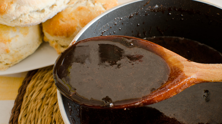 Spoonful of chocolate gravy and biscuits