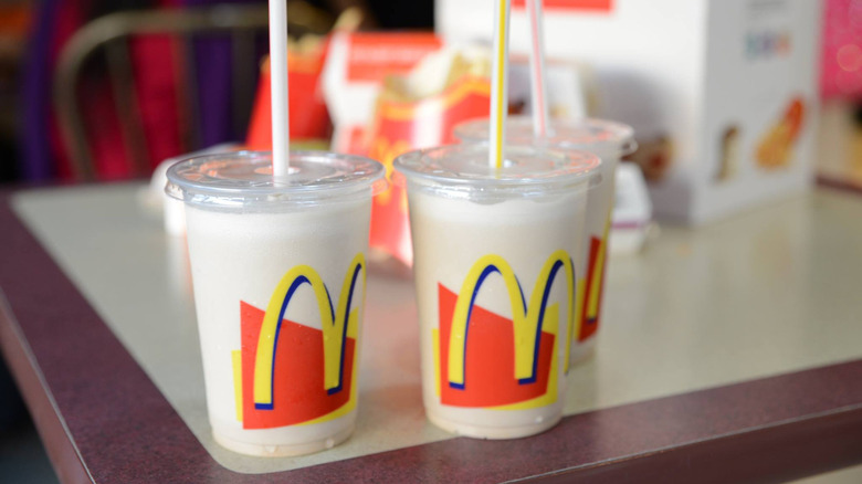 McDonald's milk shakes on table