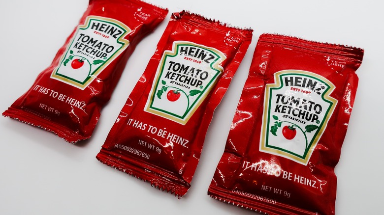 three ketchup packets