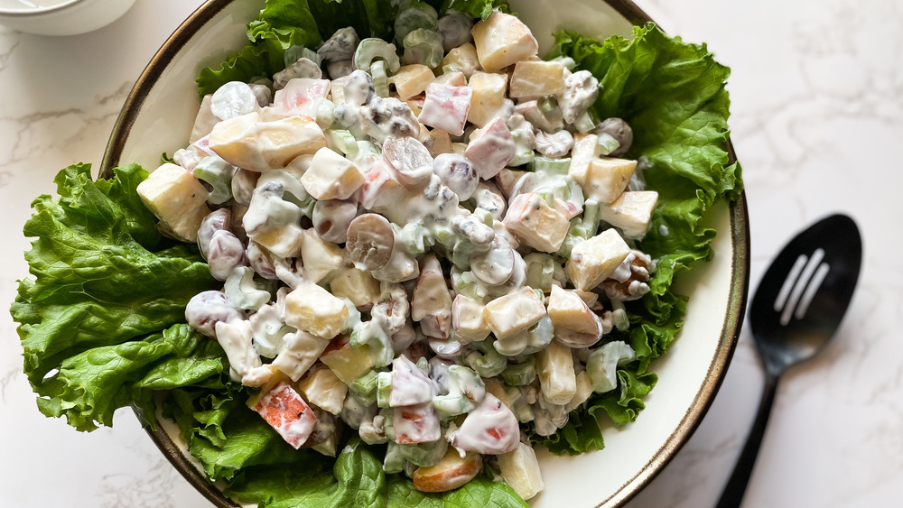 Waldorf salad over green lettuce