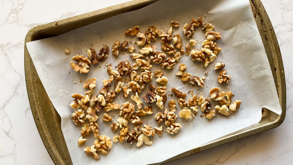 walnuts on tray with parchment