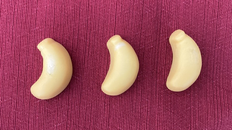 three gummy banana candies