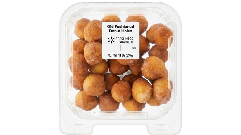 Plastic clamshell container filled with donut holes