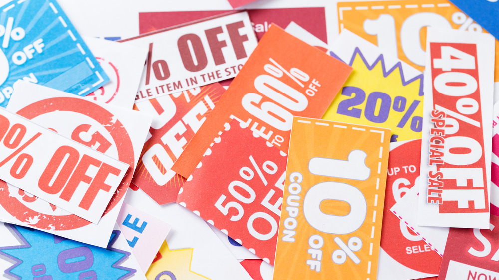 Colorful coupons scattered on surface