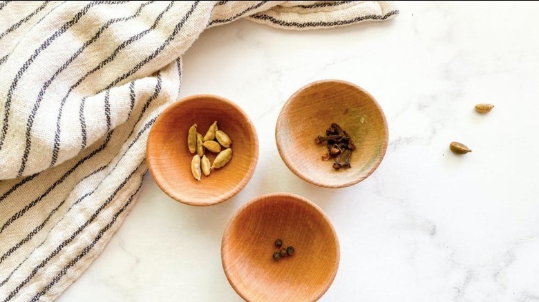 chai tea spices in bowls