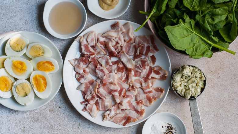 The ingredients for warm spinach salad