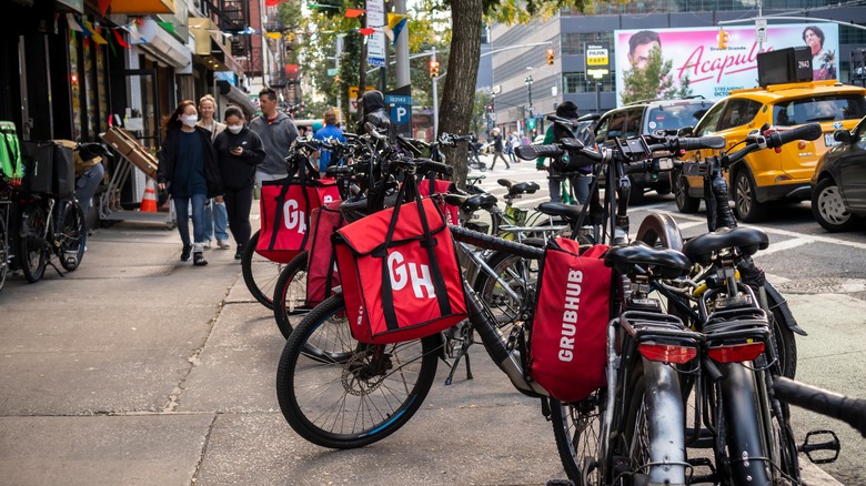 Grubhub bags on black bikes