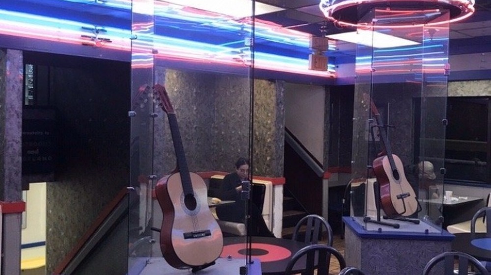 Interior shot of Van Ness Burger King with music memorabilia