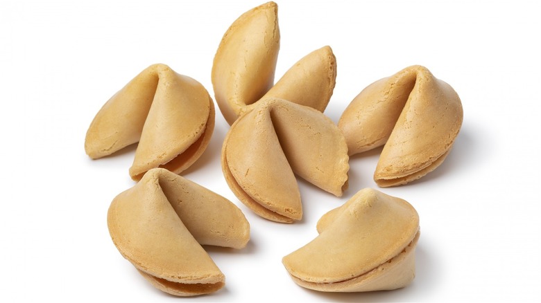 six fortune cookies on white background