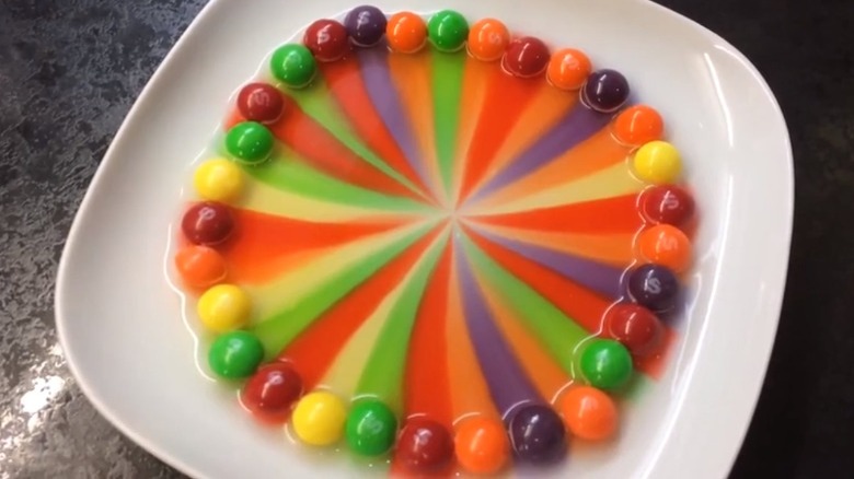 Colorful pattern of melting Skittles