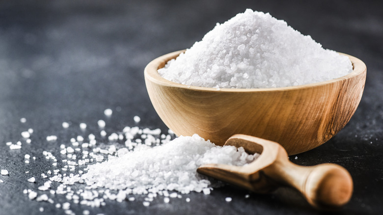 wooden bowl of salt flakes