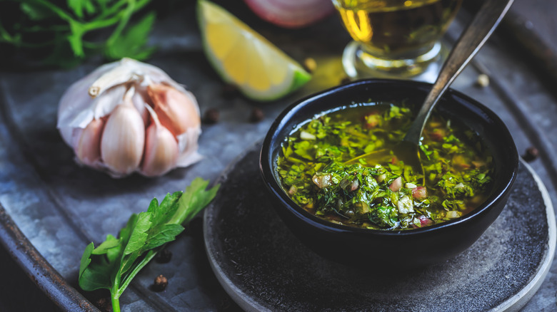 chimichurri sauce with garlic bulb