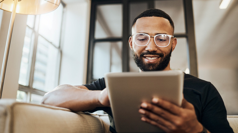 man using tablet