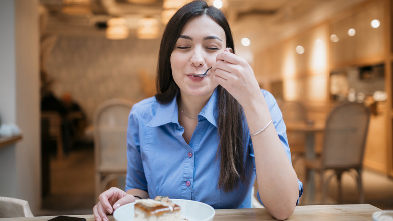 Woman savoring her sweets