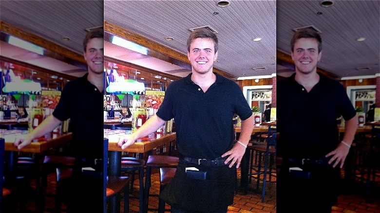 Chili's employee posing at bar