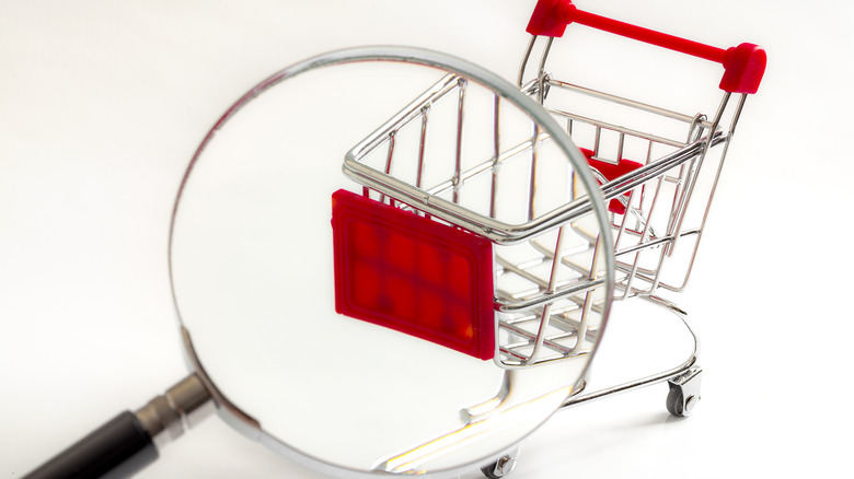 Shopping cart with magnifying glass