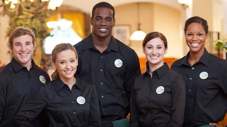 Olive Garden servers in black uniforms