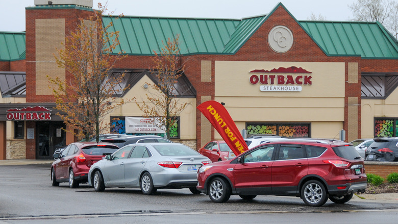 Cars in line around Outback Steakhouse