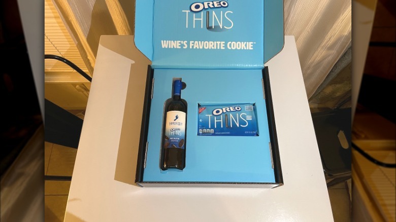 pack of oreo thins and bottle of wine