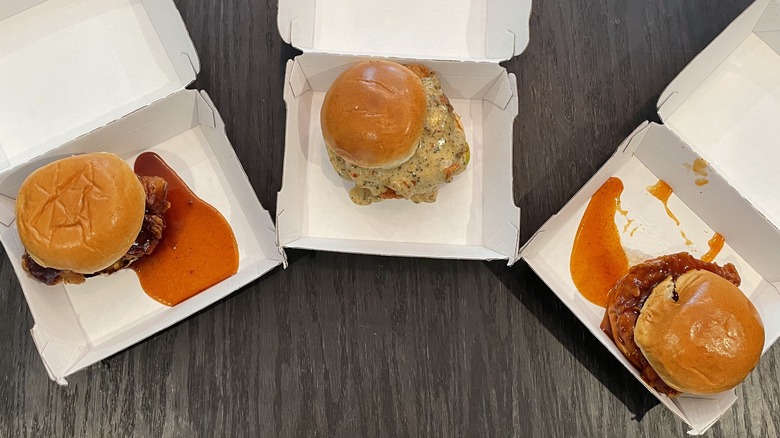 a trio of saucy chicken sandwiches