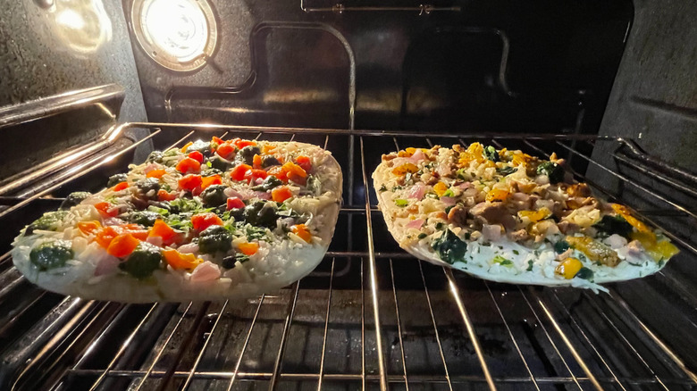 two Daiya flatbreads cooking in the oven