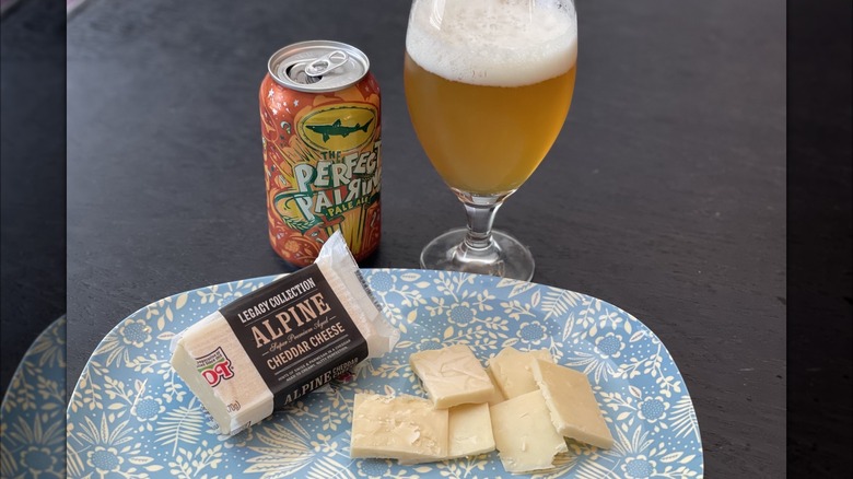 beer with cheese on a plate