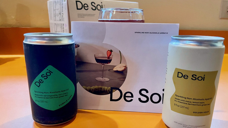 2 cans of de soi with booklet and box