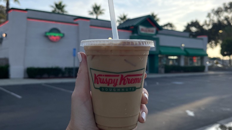 hand holding iced coffee