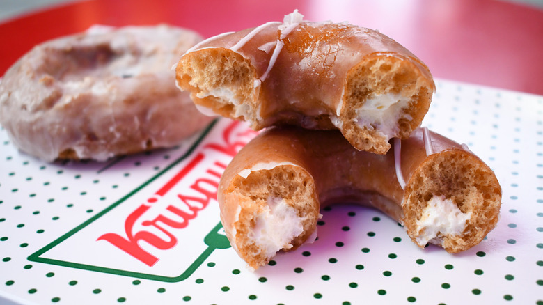 The inside of the Pumpkin Spice Original Filled Cheesecake doughnut from Krispy Kreme