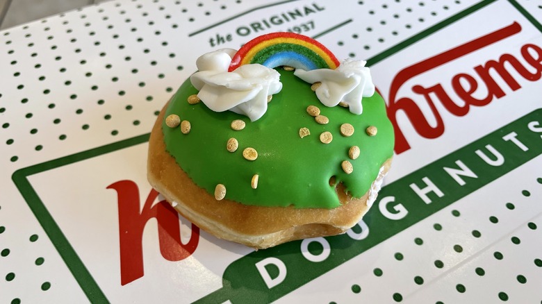 Green frosted doughnut with a rainbow