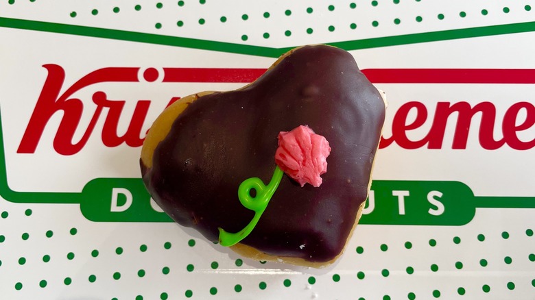 chocolate doughnut with squished rose