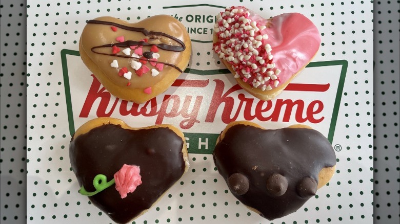 four doughnuts on a box