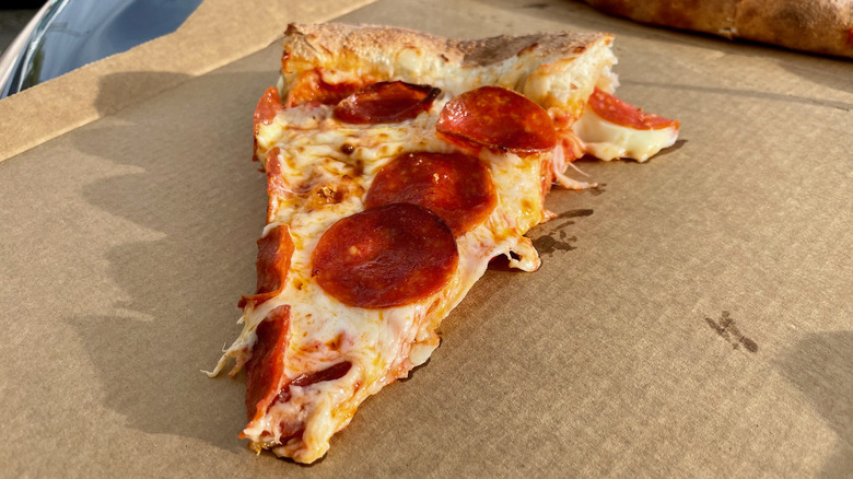 one slice of pepperoni stuffed crust pizza