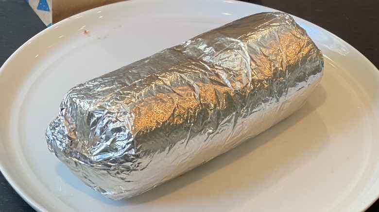 a foil-wrapped burrito