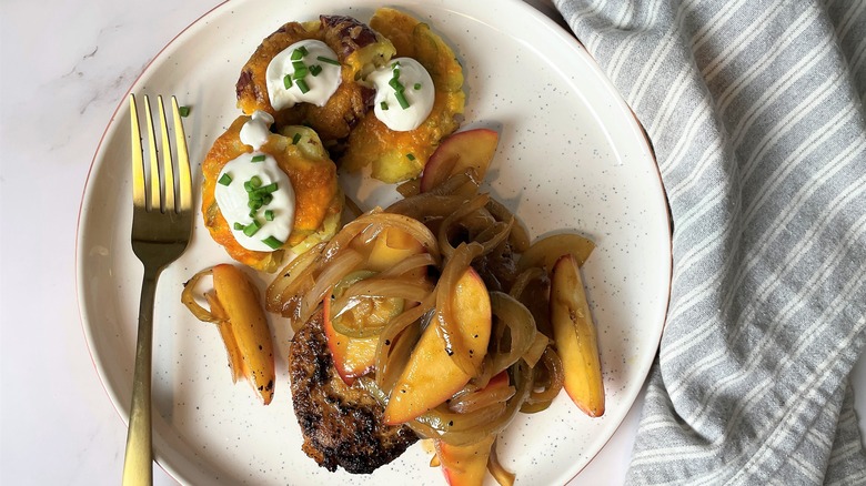 The pork chops with sweet onions and apple and cheesy crushed loaded potatoes meal kit